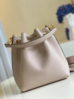 Louis Vuitton lock me bucket Bag